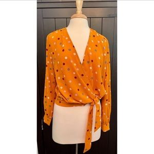 Lush - mustard colored with multicolored polka dots. Size M